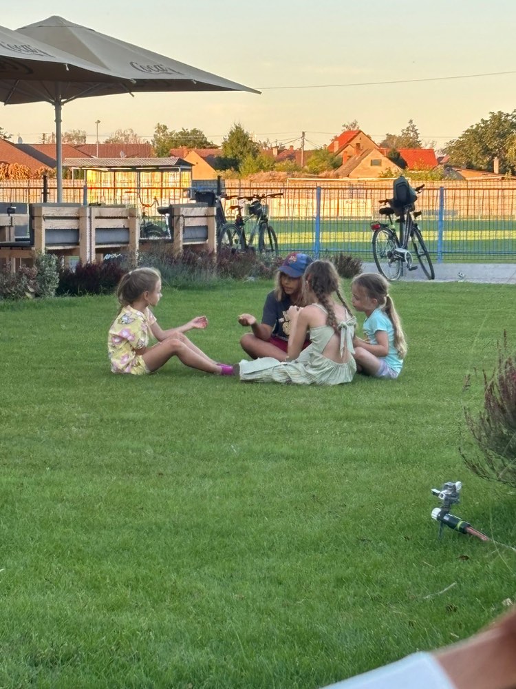 Children playing on the lawn at the guesthouse